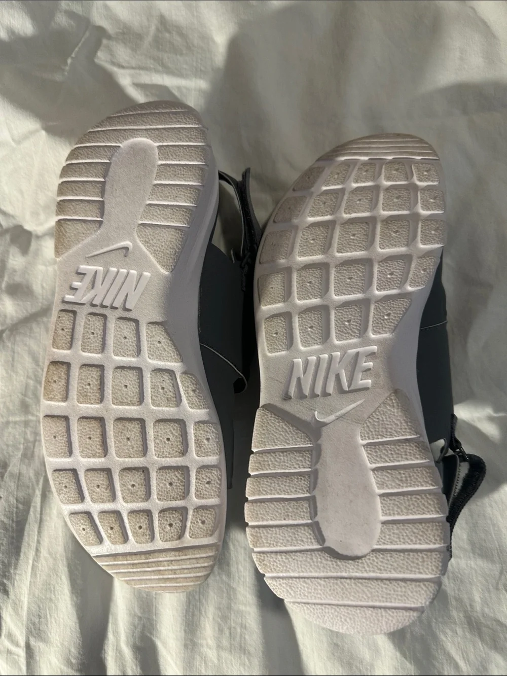 Nike Gray and White Slide Sandals with Subtle Branding